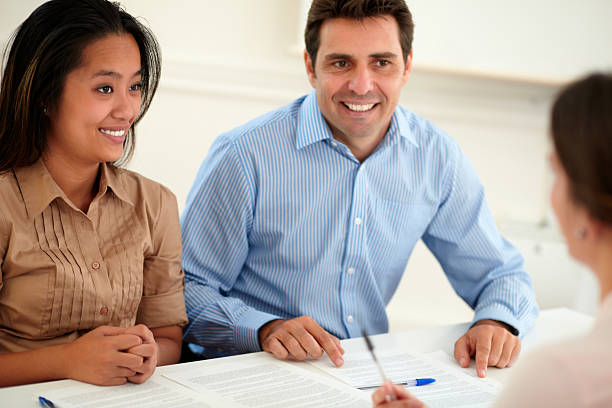 istock Young woman and man interested in a contract 492625061