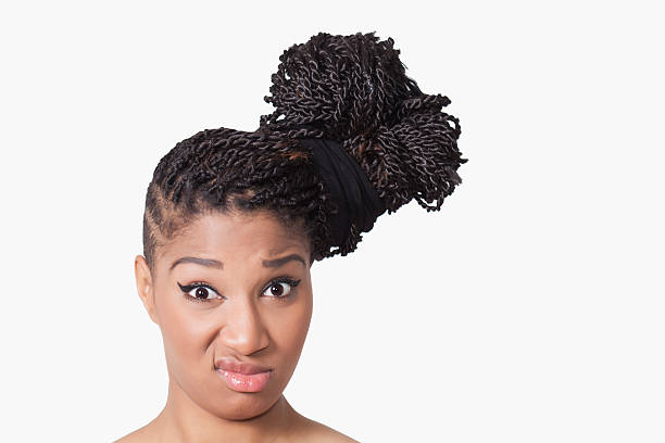 istock Girl with braids smirking 492626335