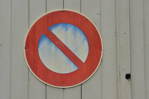 istock No parking - weathered sign 492626690