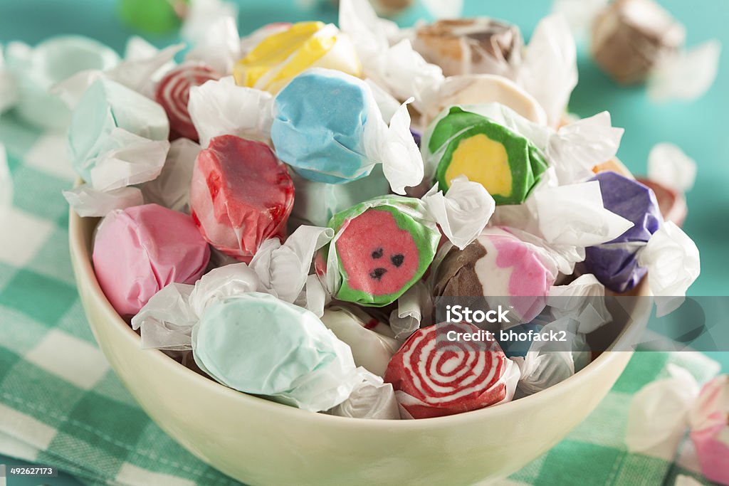 Assorted Sweet Saltwater Taffy Assorted Sweet Saltwater Taffy on a Background Candy Stock Photo