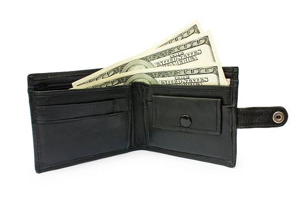 istock money into the openin a purse 492628757