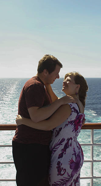 istock Honeymooners Enjoy Each Other on Ship's Fantail 492629048