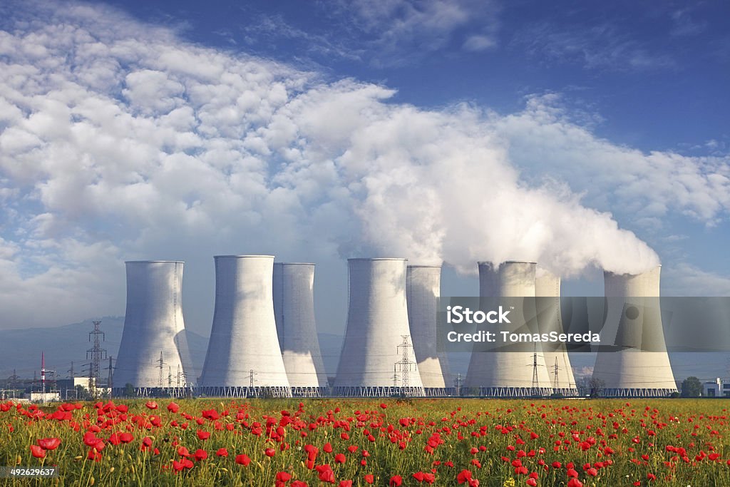 Nuclear Power plant with red field and blue sky - Royalty-free Nükleer enerji santrali Stok görsel