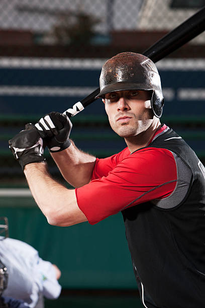 istock Baseball Player Portrait with Bat at Home Plate, Copy Space 492630214