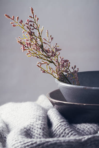 istock Still life gray vintage bowls with flowers 492631528