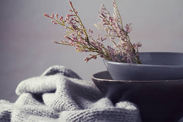 Still life gray vintage bowls with flowers horizontal