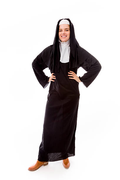 istock Young nun smiling with her arms akimbo 492631741