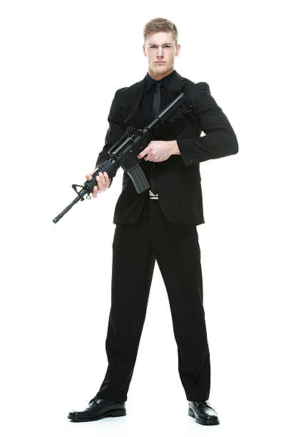 istock Businessman holding rifle 492632152