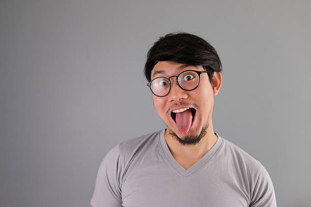 istock Happy funny face Asian man. 492641372