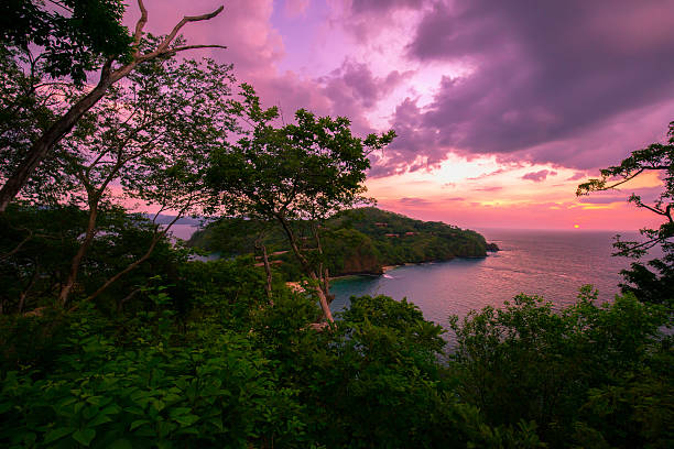 A shot of beautiful sunset over Coast Rica coastline