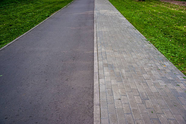 istock Pathway in the park with green grass 492651760