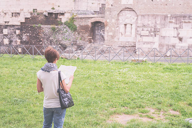 istock Tourism around Rome old town, Italy, marsala toned image. 492655018