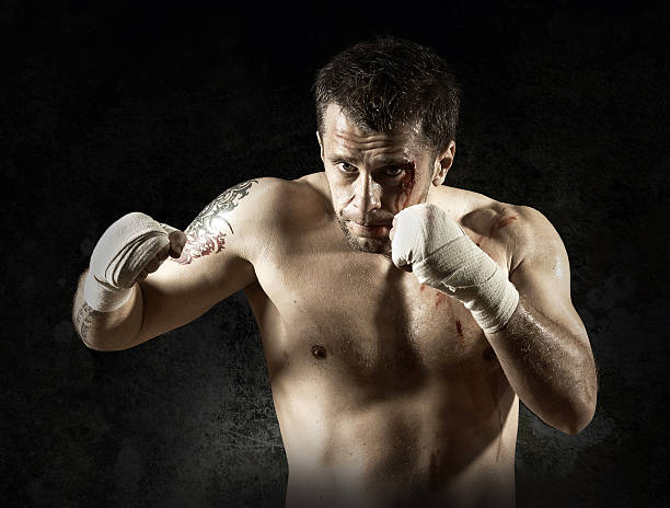 istock Portrait of aggressiv boxer in blood 492655152