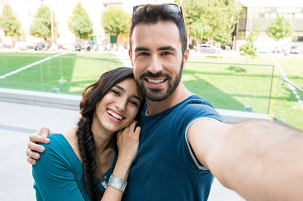 istock Young couple take selfie 492655630