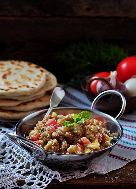 istock Eggplant caviar (salad) with tomato, white onion, olive oil 492665006