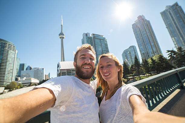 istock Happy lovers enjoying themselves in Toronto-Selfie 492668792