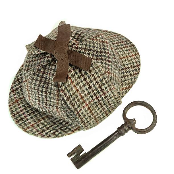 istock Investigation Concept With Deerstalker Hat And Old Key 492669400