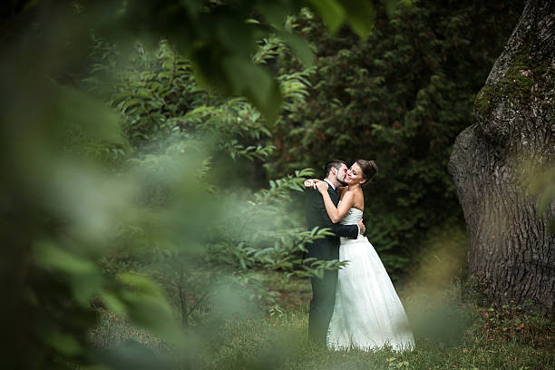istock Beautiful wedding couple posing 492672570