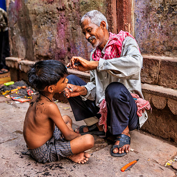 Hairdresser Cutting Boys Hair On The Streets Of Varanasi India Stock Photo  - Download Image Now - iStock