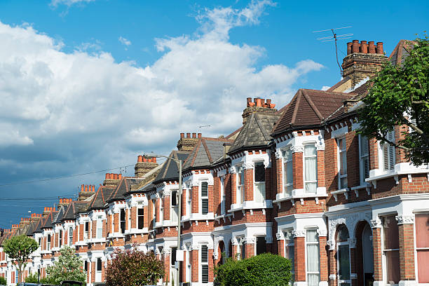 London Houses UK terraced housing. Clapham, London. Real estate on urban street in England. Terrace of houses in United Kingdom wandsworth photos stock pictures, royalty-free photos & images