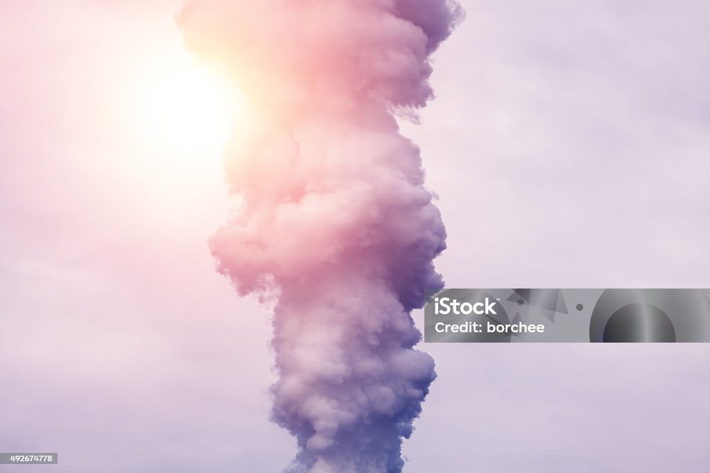Smoke Column of smoke from coal-fired power plant. Toned image. Abstract Stock Photo
