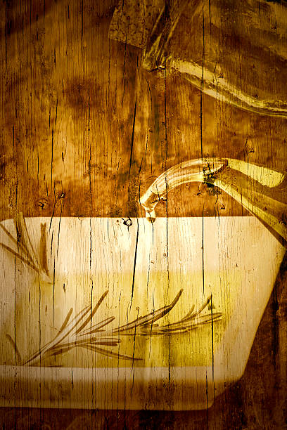 istock Bottle pouring olive oil on wooden texture 492675372