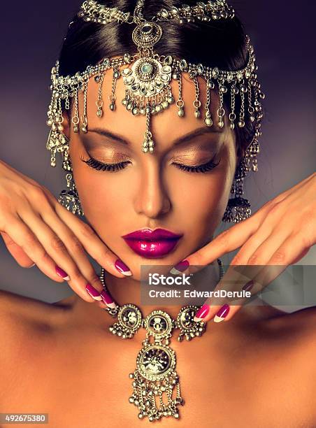 Indian Women With Closed Eyes Stock Photo - Download Image Now - 2015, Adult, Arts Culture and Entertainment