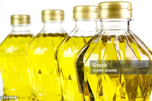 Three Bottles Oil Of Refined Palm Olein From Pericarp Stock Photo - Download Image Now