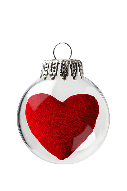 rojo corazón almohada de un adorno de navidad - valentines day teenager passion romance fotografías e imágenes de stock