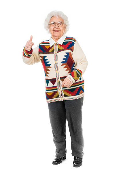 Elderly holding a cane on white background.