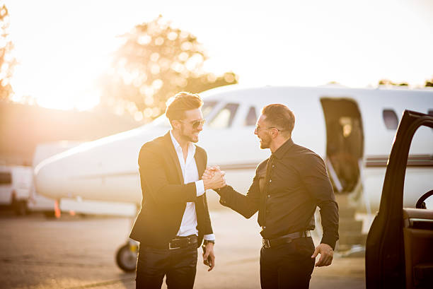istock Two men greeting at the airport 492677724