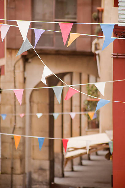 istock Feast decorations, bunting, old town, stone arches. 492677768