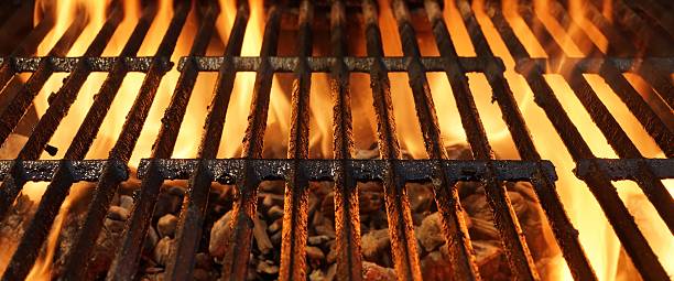 istock Hot Flaming BBQ Grill With Bright Flames And Glowing Coals 492678036