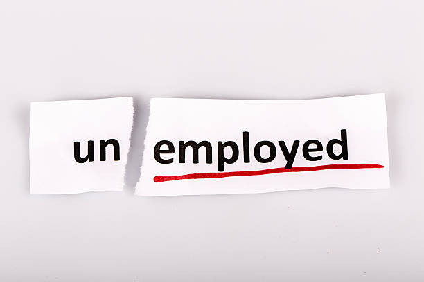 istock The word unemployed changed to employed on torn paper 492678523