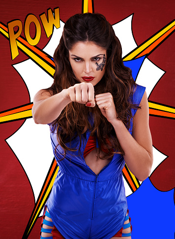 Portrait of a young superheroine in a boxing stancehttp://195.154.178.81/DATA/i_collage/pu/shoots/805732.jpg