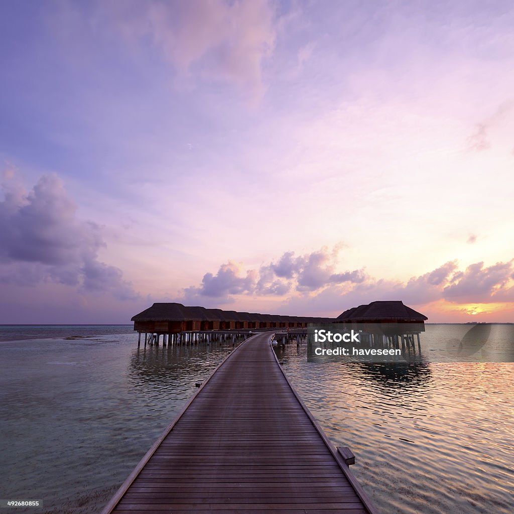 Sonnenuntergang auf den Malediven Strand - Lizenzfrei Abenddämmerung Stock-Foto