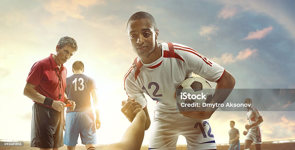 Football Players Fair Play Stock Photo - Download Image Now - Soccer,  Assistance, Good Sportsmanship - iStock