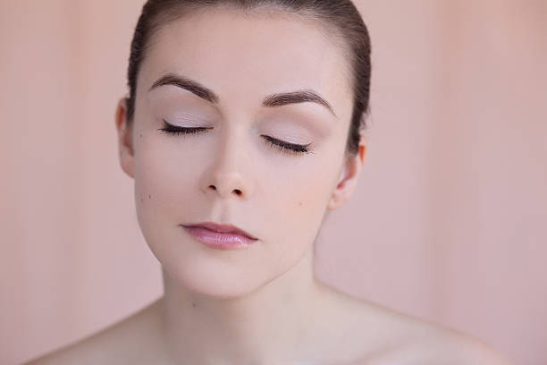 istock Beautiful young woman with natural daily makeup beauty concept 492682607