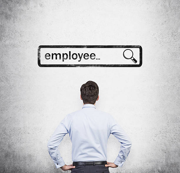 istock person looking at drawn search bar with word employee 492693458