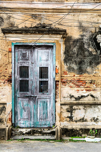 istock old ancient door with old grunge brick wall 492695036