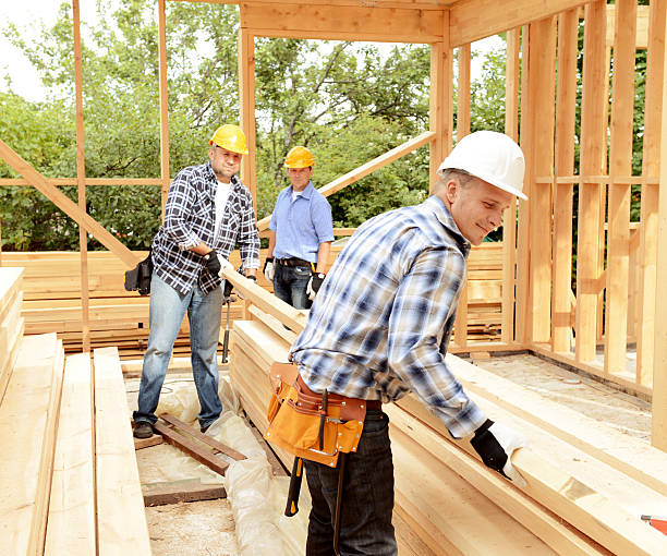 istock team of builders build frame house 492696978