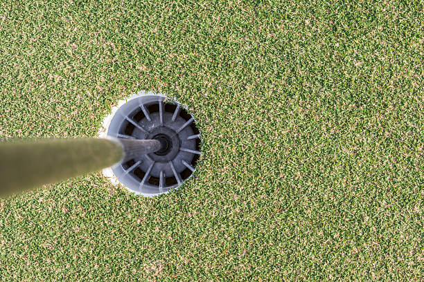 istock Aerial view of golf hole on green grass golf course. 492698342