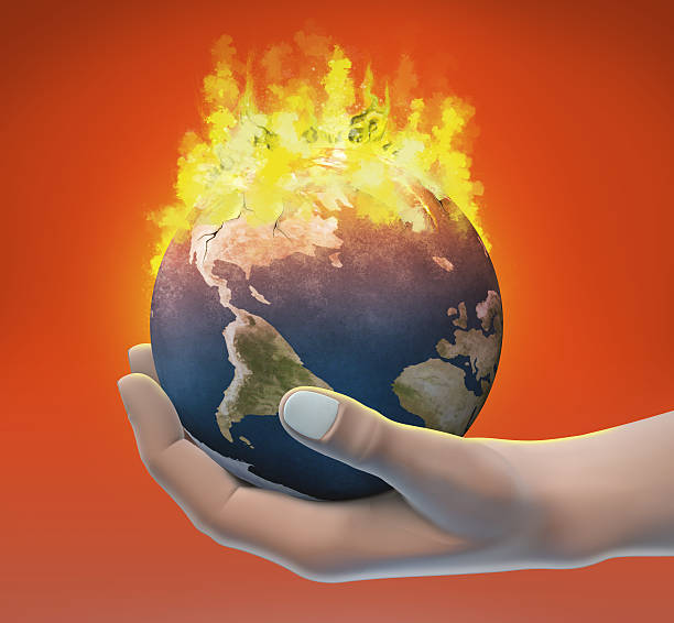 istock Planet earth burning in a human hands 492698994