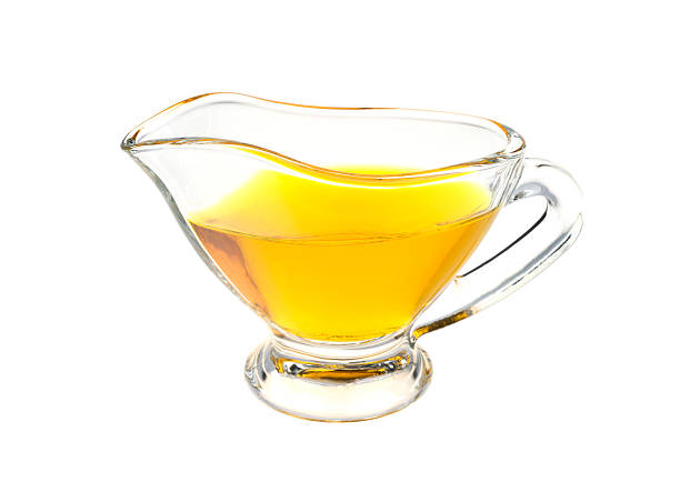 cup with linseed oil isolated oh white background