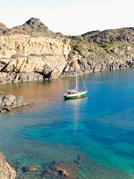 Boats on mediterranean bay. The Cap de Creus, a natural park, is ideal for excursions on foot or by boat. Situated in the northern Costa Brava, Girona province, Catalonia, Spain.