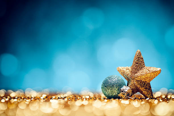 istock Christmas Star - Glitter Lights Bokeh Defocused Decoration Gold Blue 492701936