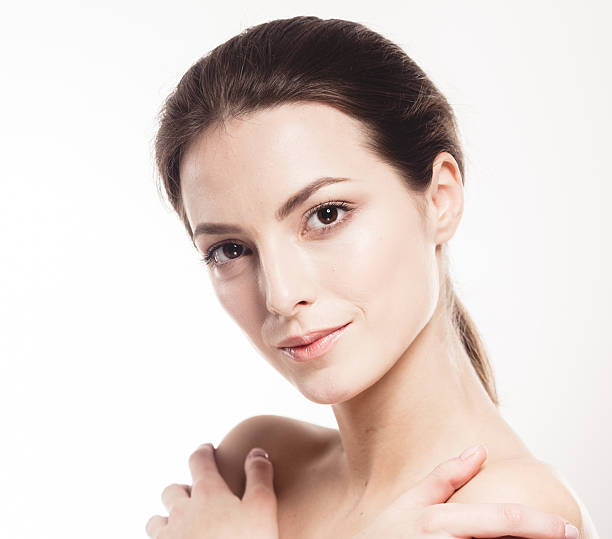 istock Beautiful woman portrait face close up studio on white 492704084