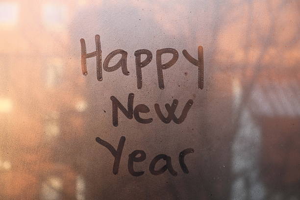 istock Happy New Year text written on the glass 492706098