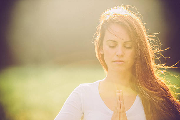 istock Young Woman Practicing Yoga Outdoors 492706808