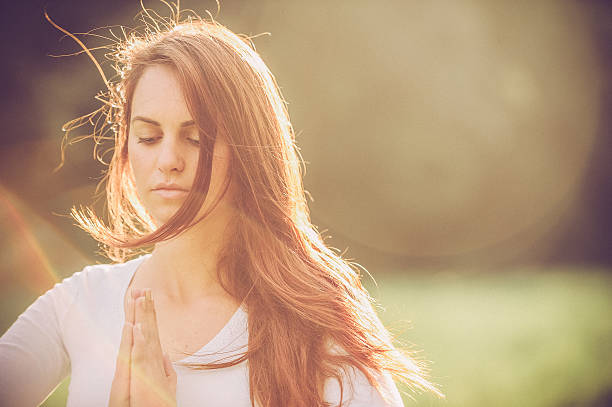 istock Young Woman Practicing Yoga Outdoors 492706960